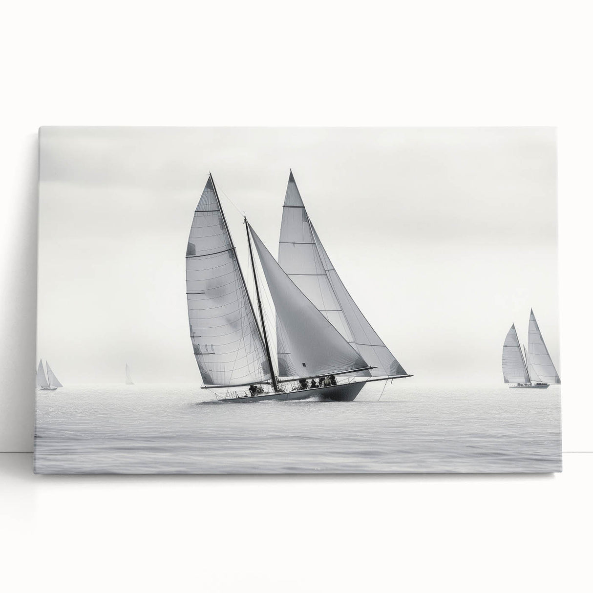 Black and white photo of a sailboat on stretched canvas, ideal for kitchen wall art or bedroom ambiance.