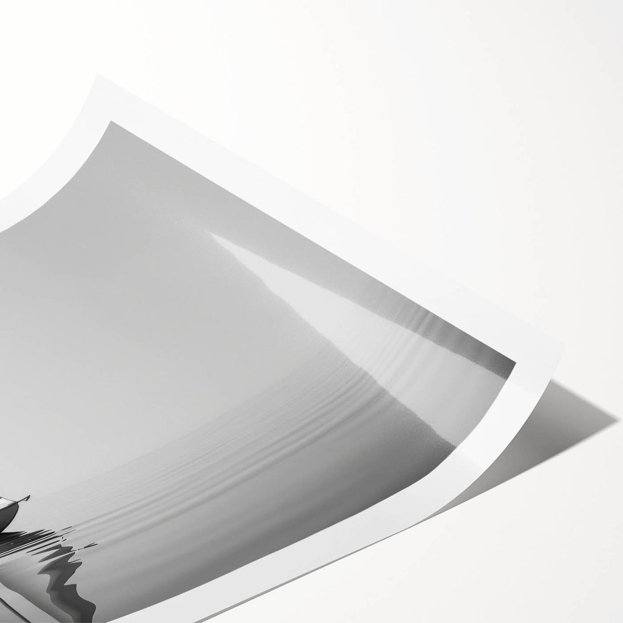 Extra large wall art featuring a sailboat on a calm sea, rendered in soft gray and blue tones on a rolled canvas.