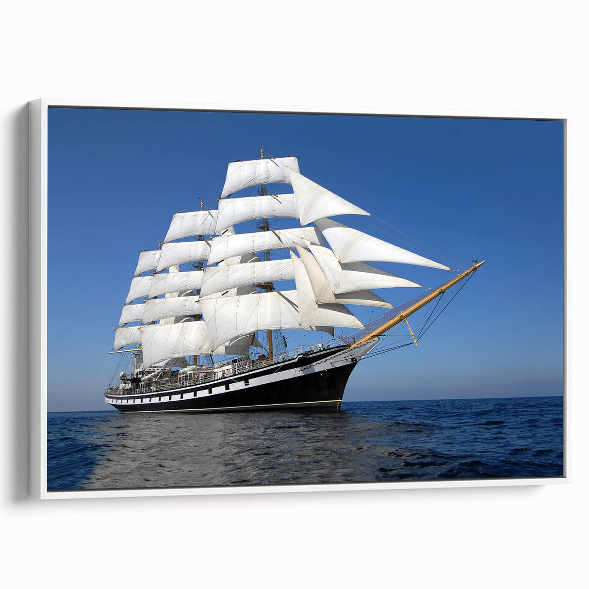 Framed canvas vintage poster art of a ship, using a black, white, and gray color palette, ideal for living room decor.