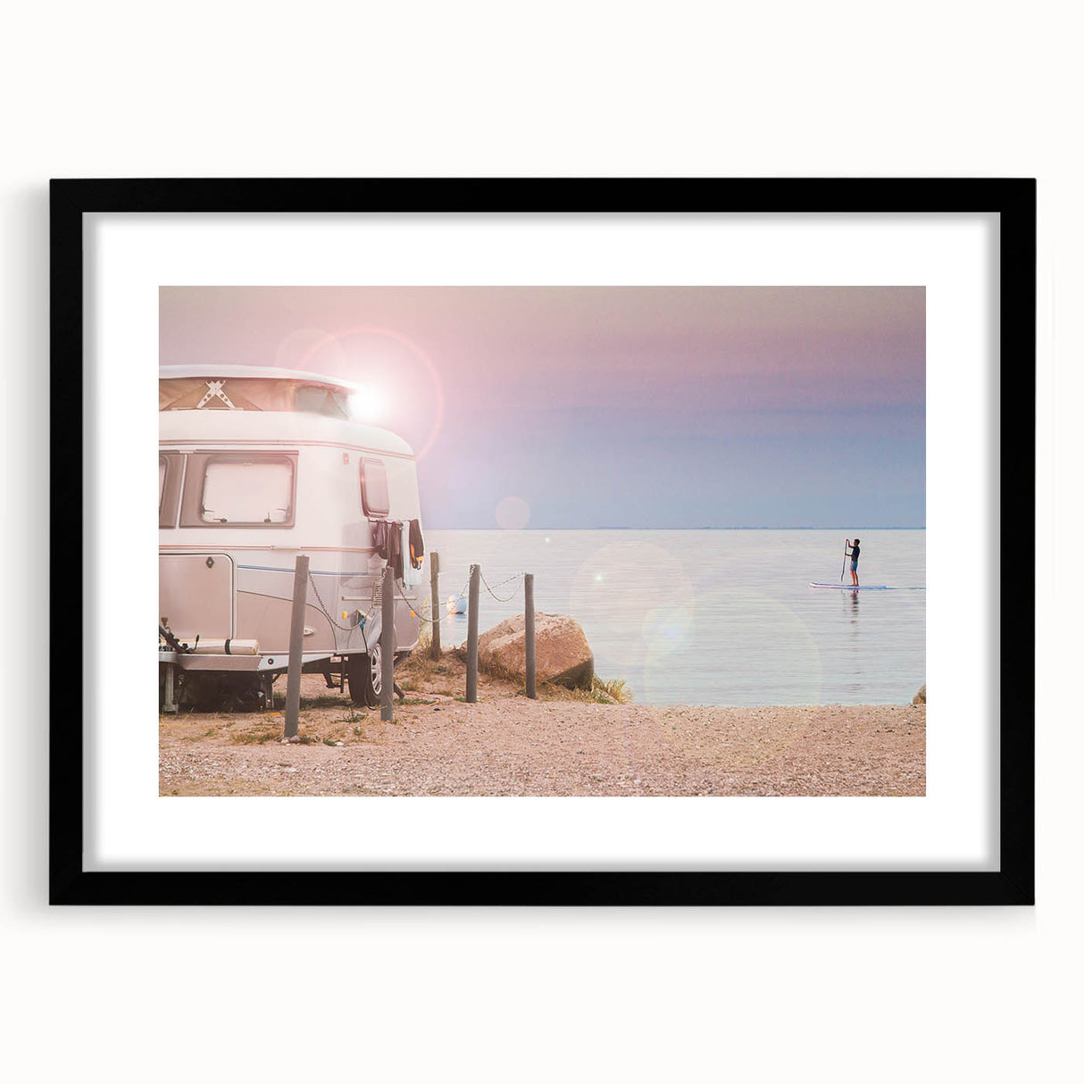 Extra large abstract art print of a colorful caravan on textured canvas, framed in black, ideal for living room decor.