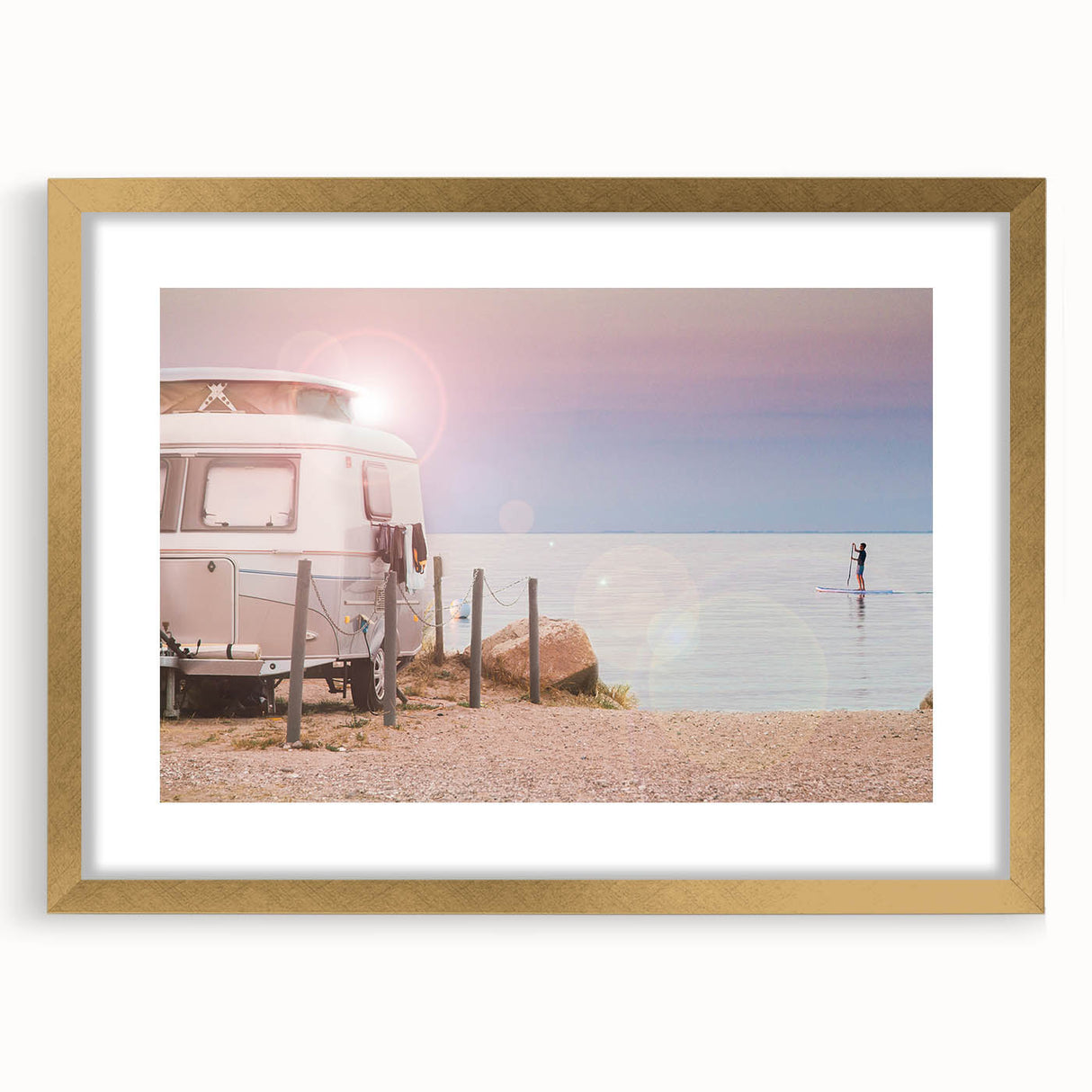 Textured abstract art print of a caravan in muted earth tones, framed in gold, ideal for bedroom art.