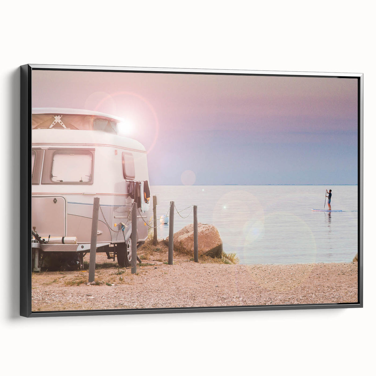 Black and white framed canvas featuring a vintage caravan in a landscape setting, ideal for bedroom wall art.