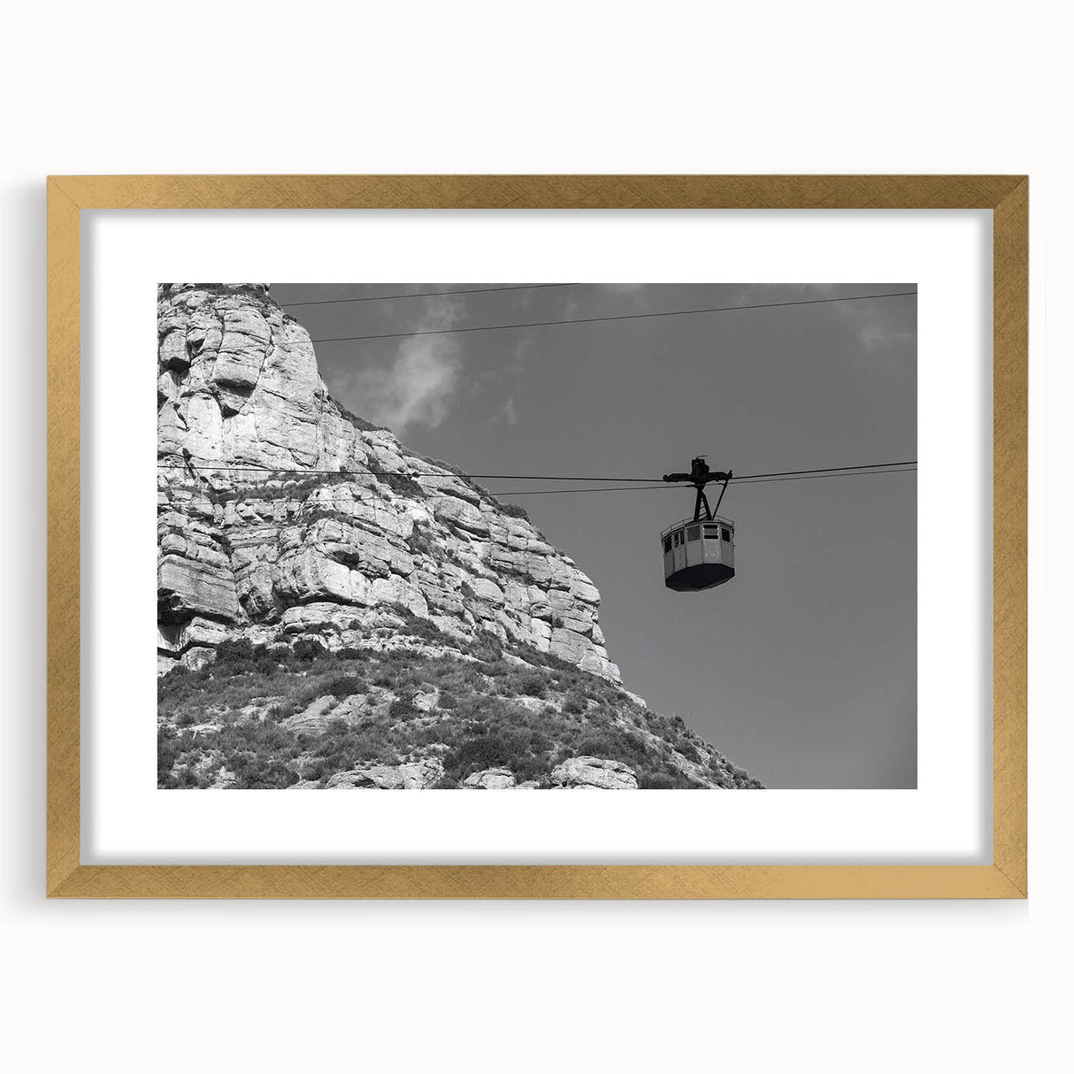 Extra large abstract art print featuring a textured design of service vehicles in muted earth tones on a gold-framed canvas.