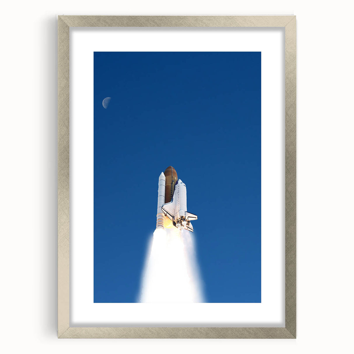 Abstract art print of a spacecraft in silver and gray tones, framed with a silver mat.