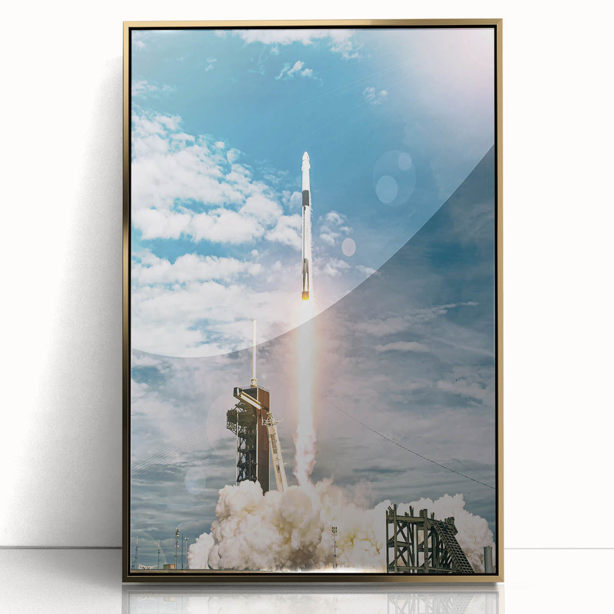 Mid-century modernist art deco poster featuring a spacecraft, in gold and black tones, framed acrylic.