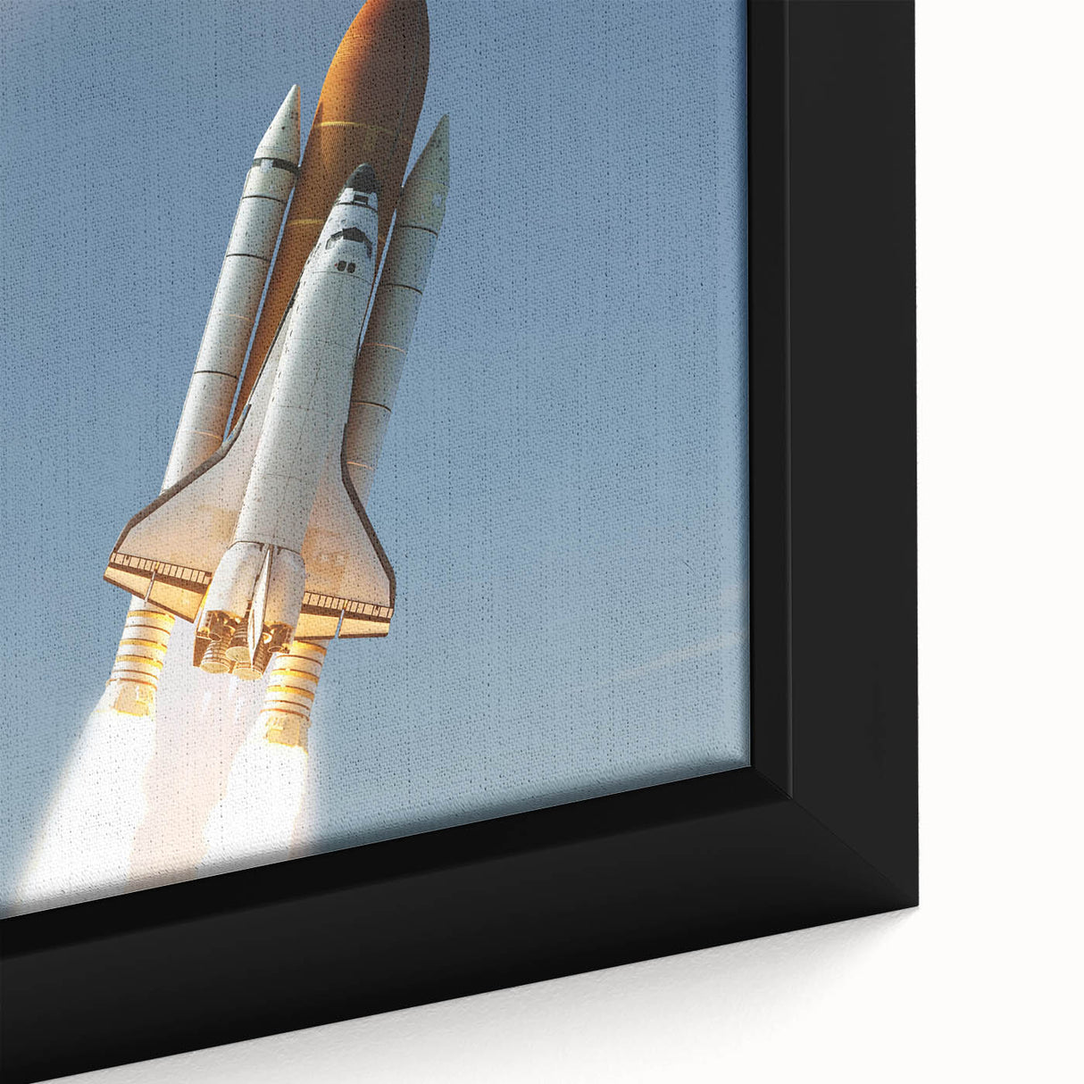 Framed canvas featuring a close-up of a spaceship in black with colorful, textured art accents.