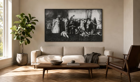 Black and white Renaissance reproduction print of a dramatic crowd scene, framed above a linen sofa in a serene modern living room with oak floors.