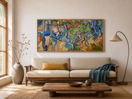 Post-impressionist tree roots painting in blue, green, and ochre, framed above a neutral sectional in a contemporary living room.