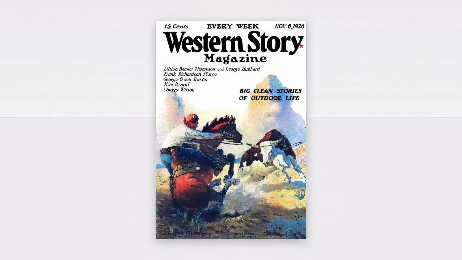 Framed vintage Western Story Magazine cover in blue, tan, and red, hung above a linen sofa in a warm neutral living room.