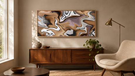 Wide marbled abstract wall art in brown, taupe, lavender, and white, framed in light wood, over walnut credenza in warm neutral living room.