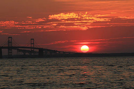 Sunset over Annapolis bridge, orange dusk sky and fluid water horizon wall art