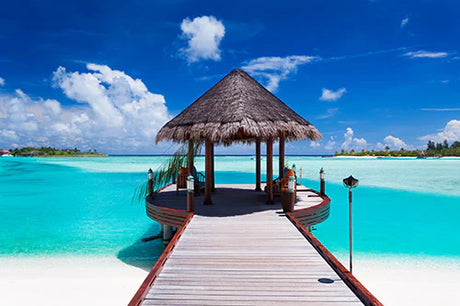 Stunning Bora Bora eco-resort wall art showcasing tranquil blue ocean and coastal landforms