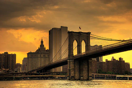 Dusk view of Brooklyn Bridge, iconic New York City landmark with captivating architecture and metropolitan skyline