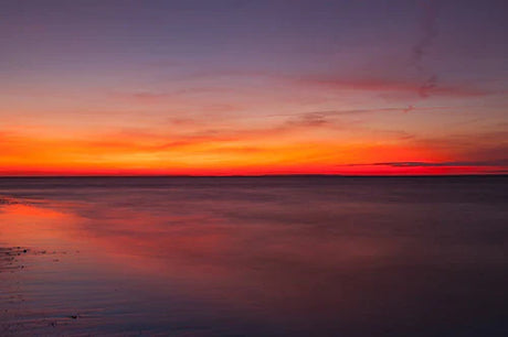 Cape Cod collection wall art featuring a stunning sunset with red-orange afterglow and fluid dusk clouds