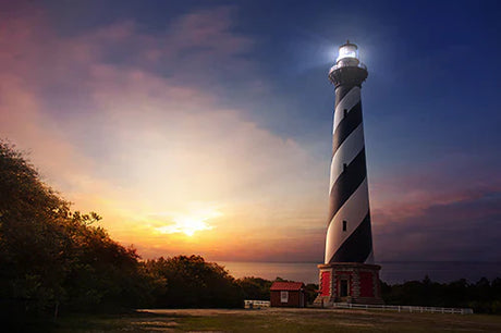 Cape Hatteras lighthouse beacon at dusk with stunning sunset and red morning sky wall art