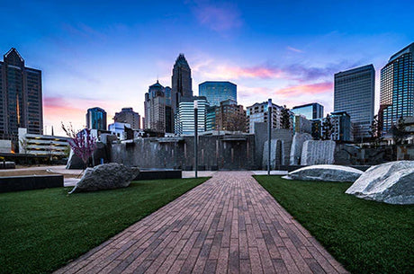 Daytime view of skyscrapers and high-rise buildings in Charlotte's urban metropolitan area, featured in the 'Charlotte' wall art collection.