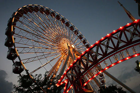 Daytime photograph of a red Ferris wheel at a Chicago amusement park landmark