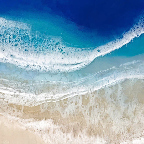 Coastal collection blue wall art featuring abstract ocean wave canvas print for living room decor.