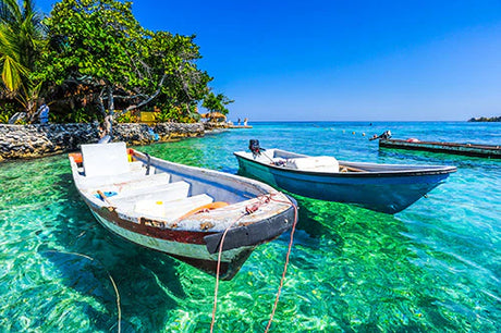 Blue boat on sea with coastal landforms, part of Colombian wall art collection