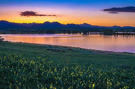 Stunning Colorado wall art showcasing mountainous landscape, dusk horizon, and vibrant afterglow.