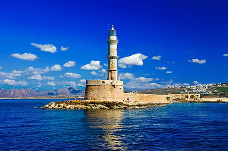 Crete Collection wall art featuring a lighthouse, coastal tower, and serene oceanic bay