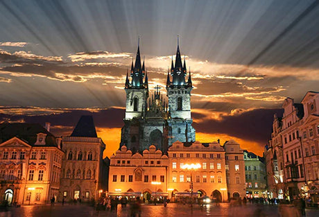 Night view of medieval architecture, landmark steeple and spire in Czech Republic town