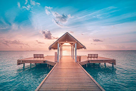 French Polynesia wall art featuring a tranquil blue ocean, cloud-filled horizon, and scenic boardwalk pier.