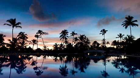 Haitian Wall Art featuring a stunning sunset reflection on the sea at dusk