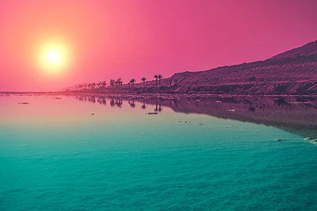 Jordan Collection wall art featuring vibrant orange and pink hues over a serene coastal landscape