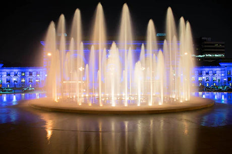 Night view of a fluid water feature at a tourist attraction in Kansas City