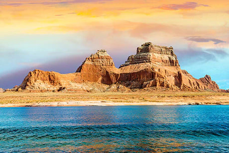 Stunning Lake Powell wall art featuring blue sky, rocky badlands, and natural plateau landscape