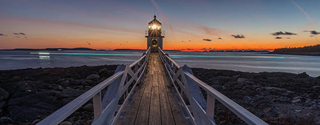 Dusk at Maine Seaside with Lighthouse Overlooking Sunset Afterglow on Horizon