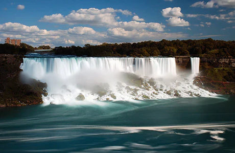 Stunning Niagara Falls wall art featuring a natural watercourse and rocky landscape