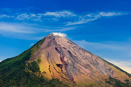Stunning volcanic mountain range in Nicaragua, featuring hills, highlands, and clouds.