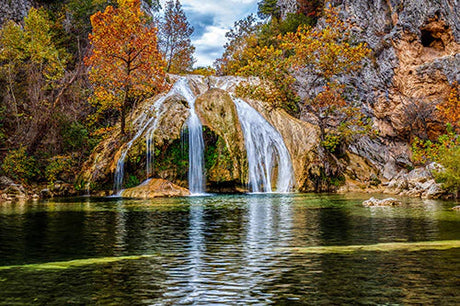 Oklahoma collection wall art featuring a natural landscape with wilderness, waterfall, and rocky stream