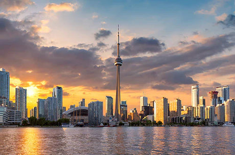 Daytime view of high-rise buildings in Ontario's metropolitan urban area under a blue sky with clouds