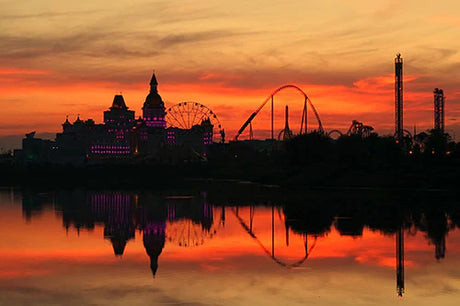 Stunning Russian wall art featuring a sunrise with a red sky reflecting on water at dusk
