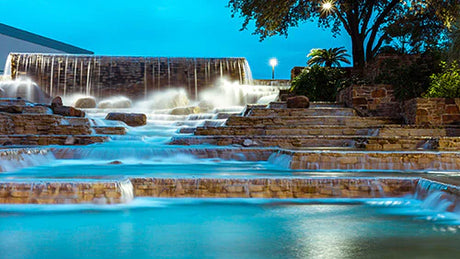 San Antonio collection wall art featuring a lush garden with a waterfall and fountain design