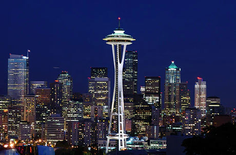 Seattle skyline wall art featuring illuminated Space Needle at night with city lights – modern urban decor for home or office