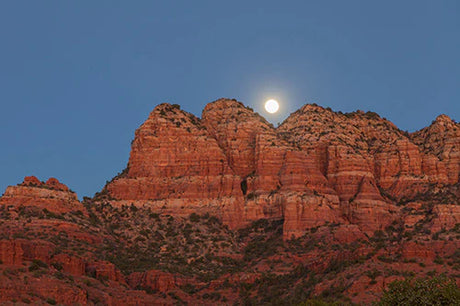 Sedona Collection wall art featuring moon over mountainous badlands and rocky outcrop terrain.