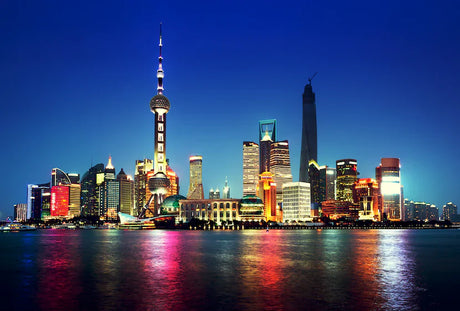 Blue sky over Shanghai's metropolitan area featuring high-rise buildings and skyscrapers