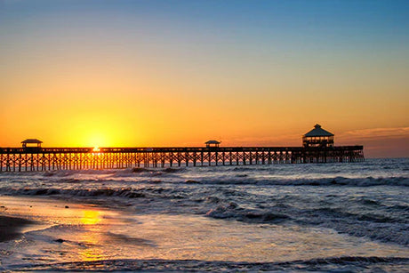 Sunset over South Carolina ocean with fluid waves and dusky horizon wall art
