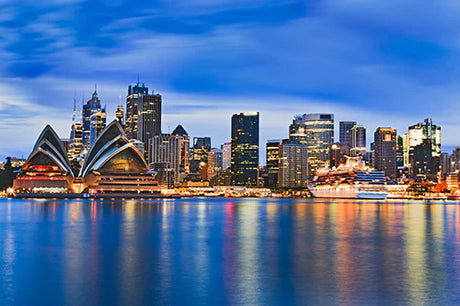 Sydney collection wall art featuring a metropolitan cityscape with skyscrapers and waterway.