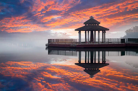 Vibrant sunset over Taiwan's horizon with dusky reflections in water, wall art collection
