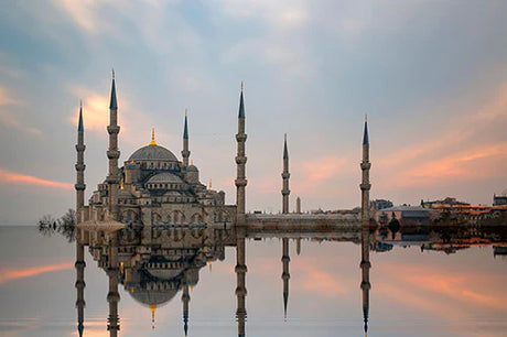 Byzantine architecture of a landmark mosque with dome, spire, and tower in Turkey