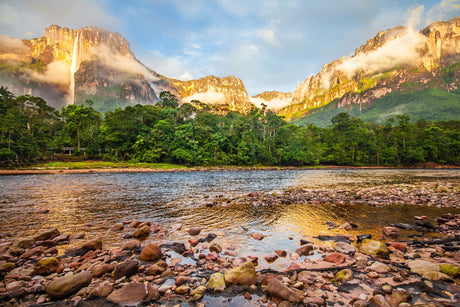 Venezuelan mountain range wall art featuring natural landscape, cloud-covered hills, and rocky watercourse.