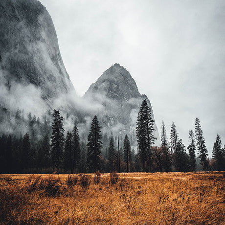 Rustic wall art featuring a natural landscape with sky, mountainous landforms, hill, and wilderness canvas print.