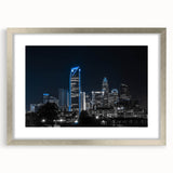 Textured abstract art print in muted gray and blue tones on canvas, suitable for modern bedroom ambiance.