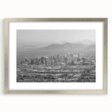 Textured abstract art print in muted earth tones on canvas, suitable for enhancing a bedroom's ambiance.