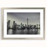 Textured abstract art print in muted gray and blue tones on canvas, suitable for bedroom ambiance.